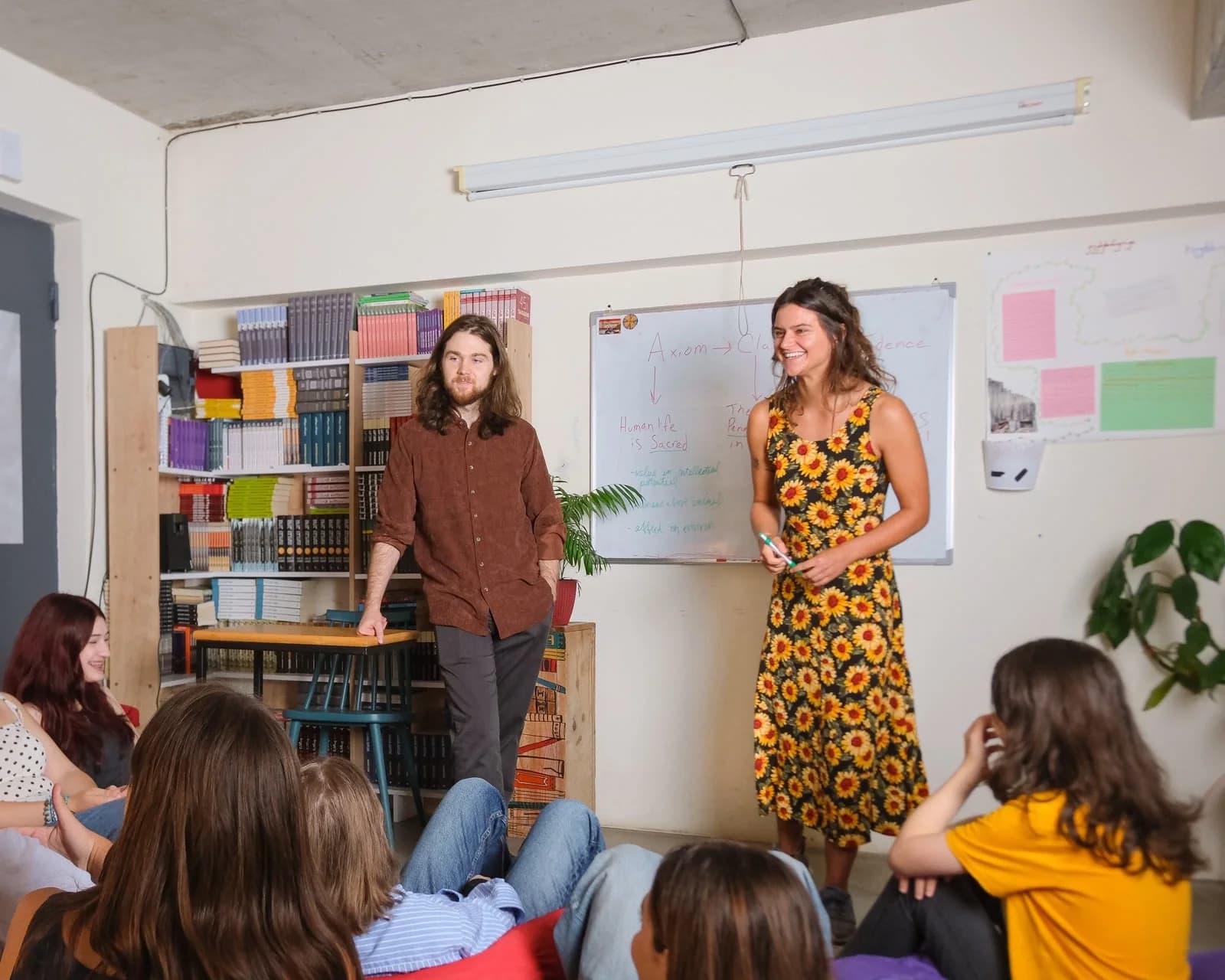 Classroom workshop with a teacher at a whiteboard